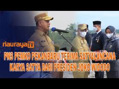 PEGAWAI PEMKO PEKANBARU TERIMA SATYALANCANA DARI PRESIDEN JOKOWI